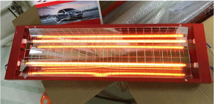 Đèn sấy sơn ô tô dạng máng màu đỏ đang bật bóng hồng ngoại